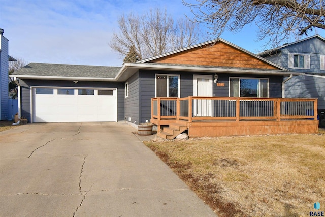 ranch-style home featuring a garage