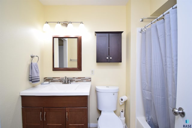 full bathroom featuring shower / tub combo, vanity, toilet, and backsplash