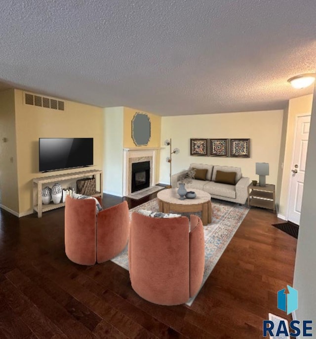 living room with dark hardwood / wood-style flooring, a high end fireplace, and a textured ceiling