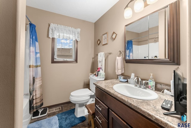 full bathroom with vanity, shower / bath combination with curtain, and toilet