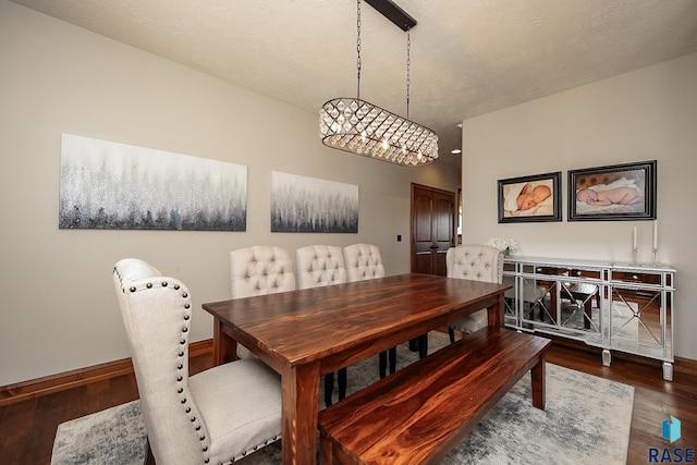 dining area featuring dark hardwood / wood-style floors