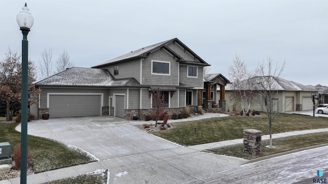 view of front facade with a front lawn and a garage