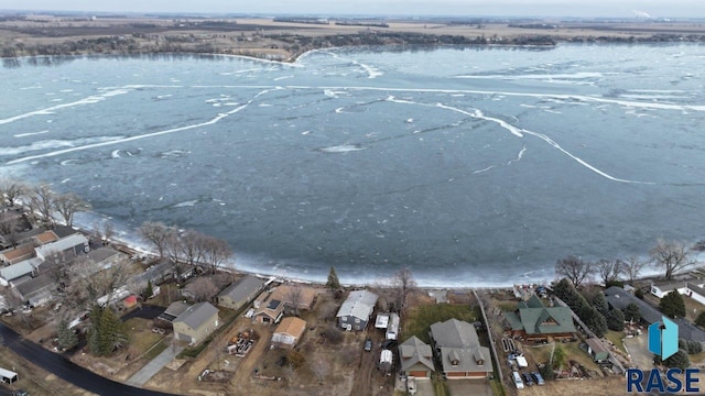 birds eye view of property featuring a water view