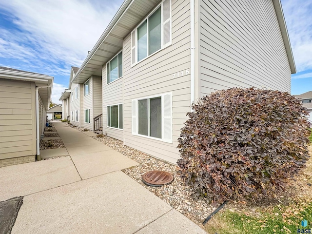 view of property exterior featuring a patio