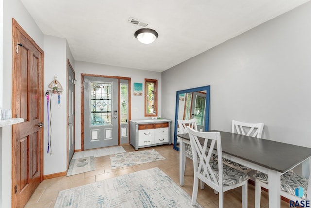 interior space with light tile patterned floors