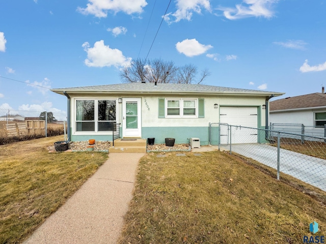 view of front of home with a garage and a front yard