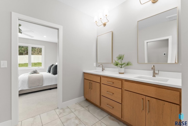 bathroom featuring vanity and ceiling fan