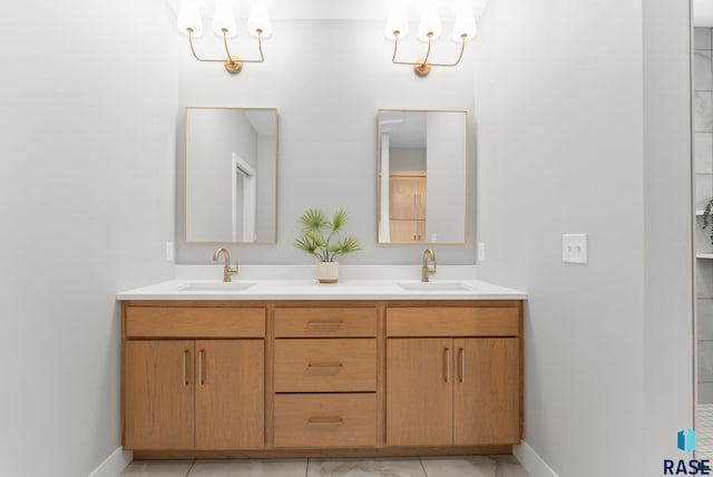 bathroom with tile patterned floors and vanity