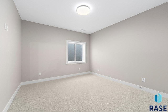 empty room featuring carpet