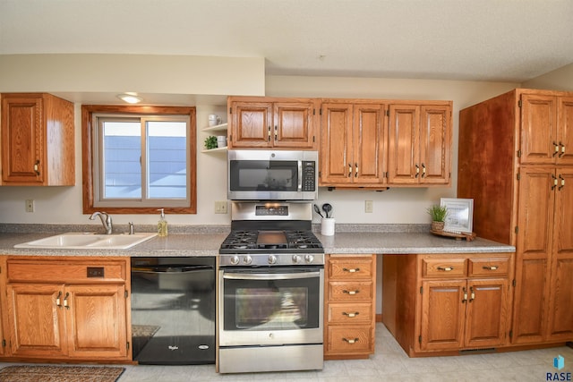 kitchen featuring appliances with stainless steel finishes and sink