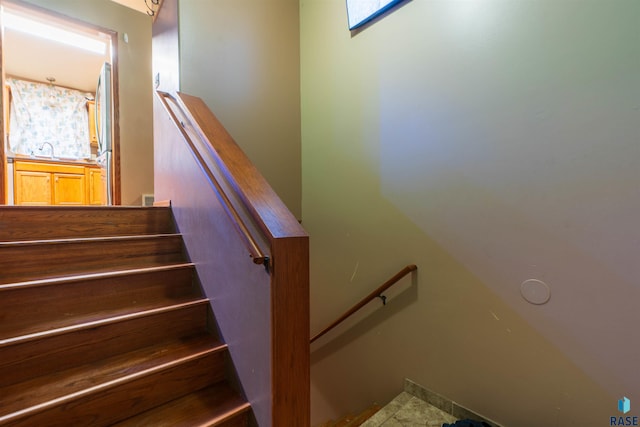 staircase with sink