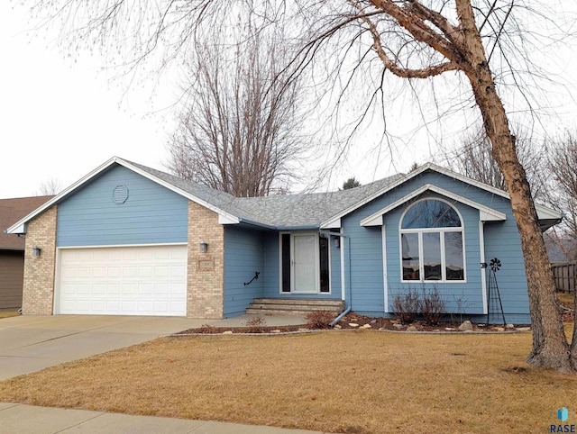 ranch-style home with a garage