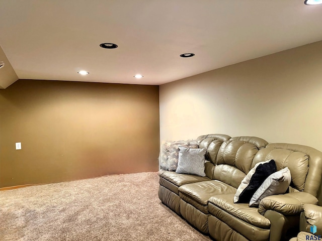 carpeted living room featuring vaulted ceiling