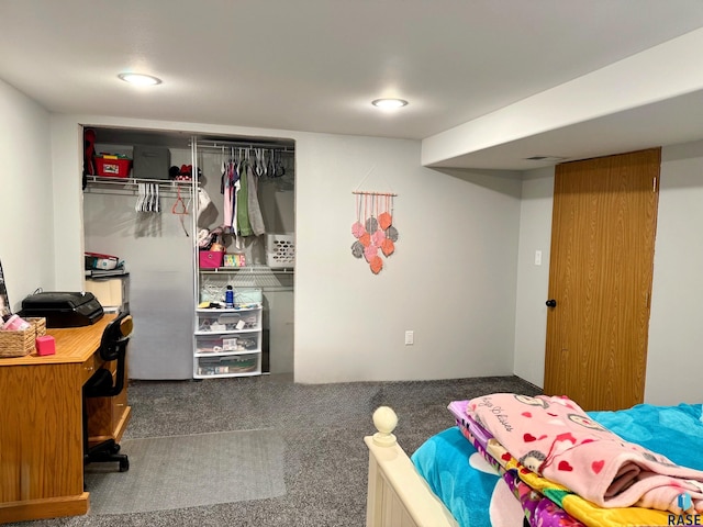 carpeted bedroom featuring a closet