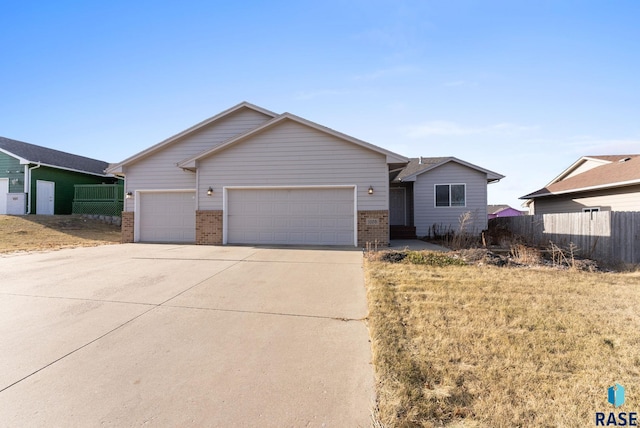 single story home featuring a garage