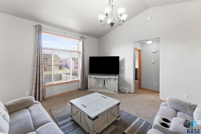 living room with carpet, an inviting chandelier, and vaulted ceiling