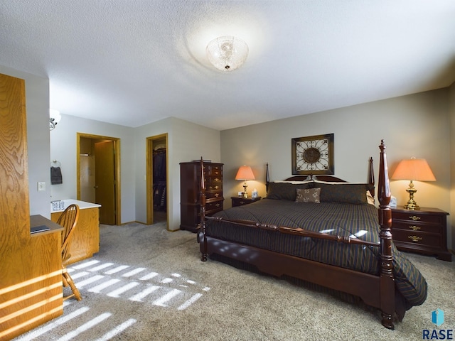 bedroom featuring light colored carpet