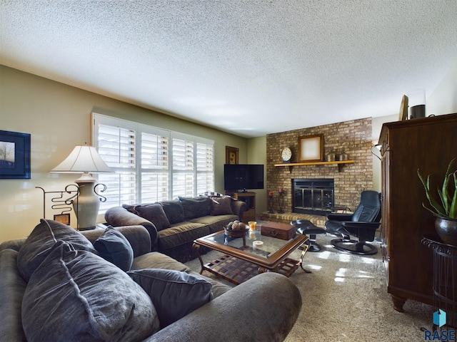 living room featuring carpet, a textured ceiling, and a brick fireplace