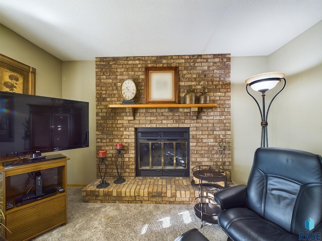 carpeted living room with a fireplace