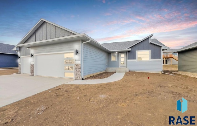 view of front of property featuring a garage