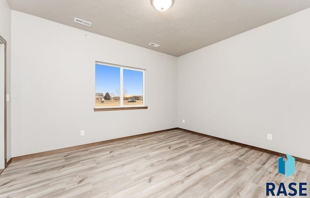 1220 N Rose Ave, Tea, SD 57064 - spare room with light wood-type flooring