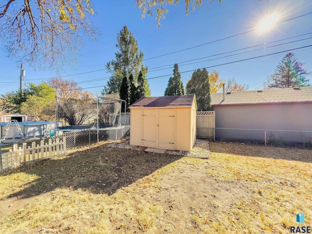 view of yard with a storage shed