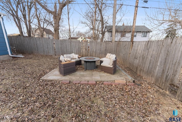 view of yard with a patio and a fire pit