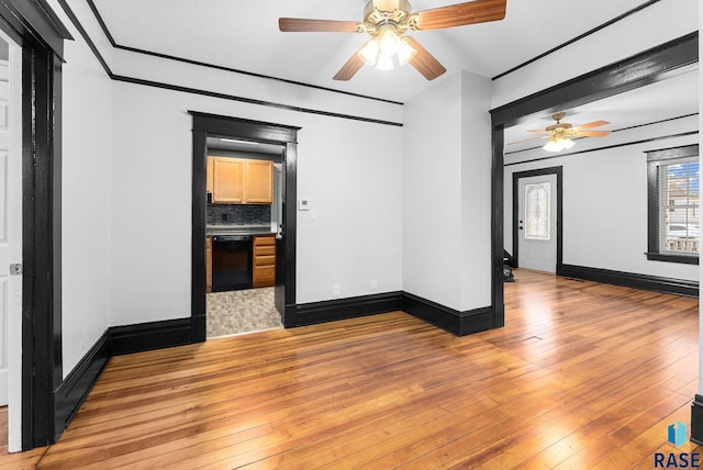 unfurnished room featuring light hardwood / wood-style floors and ceiling fan