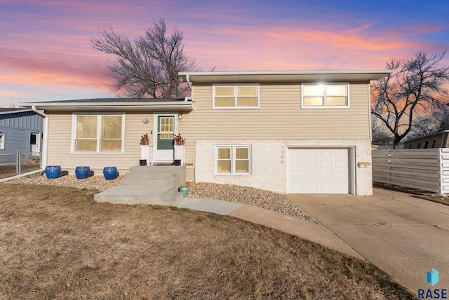 tri-level home featuring a garage