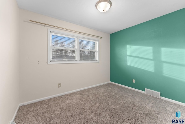 spare room with carpet flooring