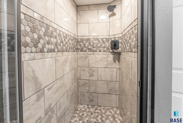 details with a tile shower