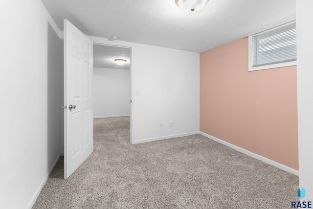 interior space with a textured ceiling