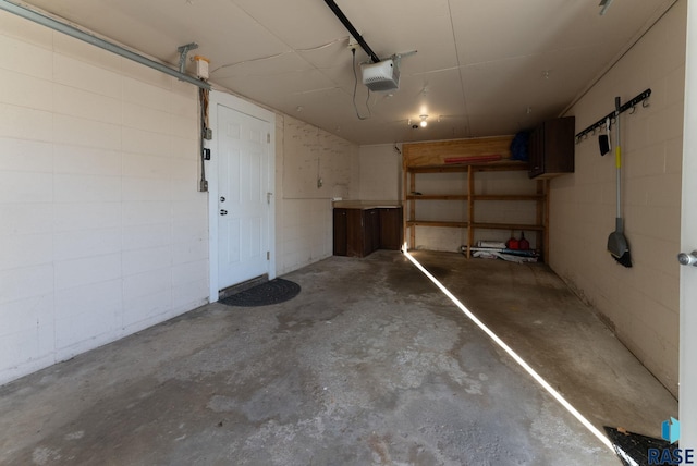 garage featuring a garage door opener