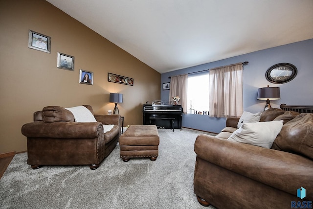 carpeted living room featuring vaulted ceiling