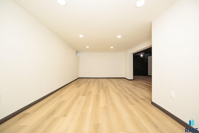 spare room featuring light wood-type flooring