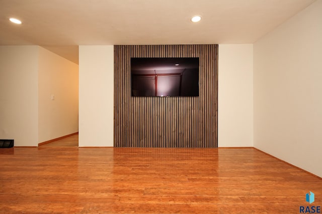 spare room featuring light wood-type flooring