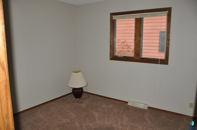 empty room featuring carpet floors