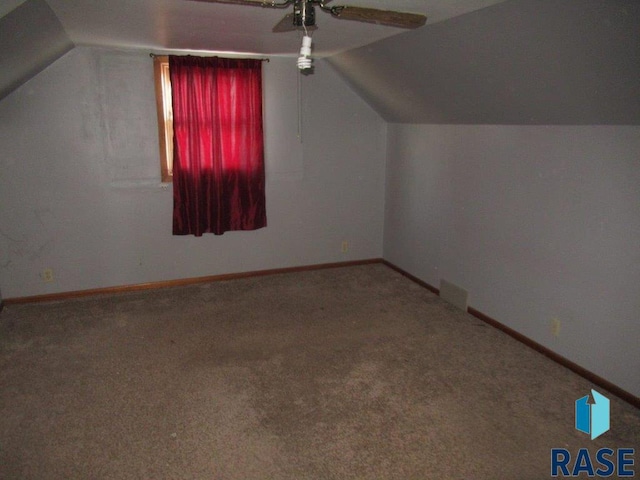 bonus room featuring carpet, ceiling fan, and lofted ceiling