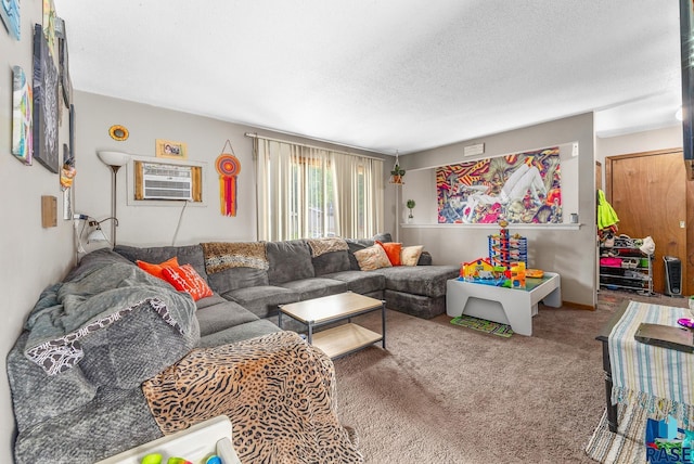 living room featuring a wall mounted air conditioner, a textured ceiling, and carpet flooring