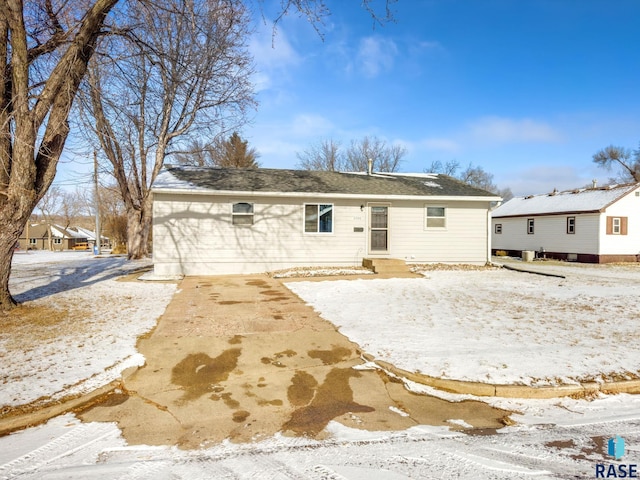 view of snow covered property