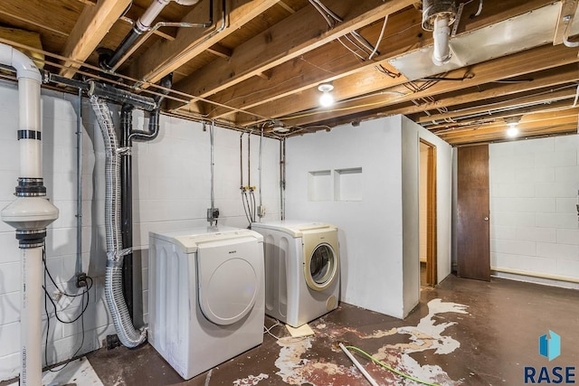 washroom featuring washer and dryer