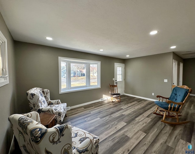 living area featuring hardwood / wood-style flooring