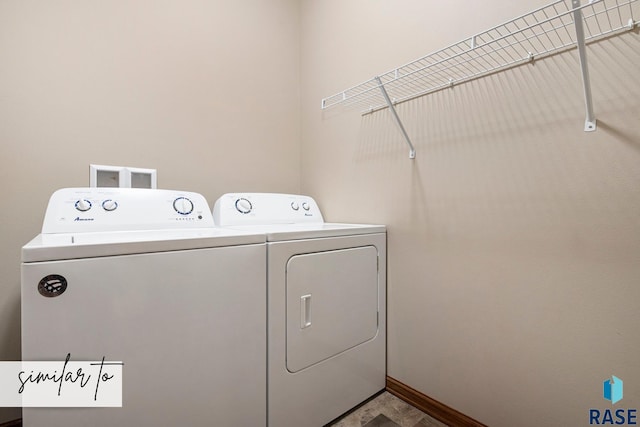 laundry room featuring separate washer and dryer