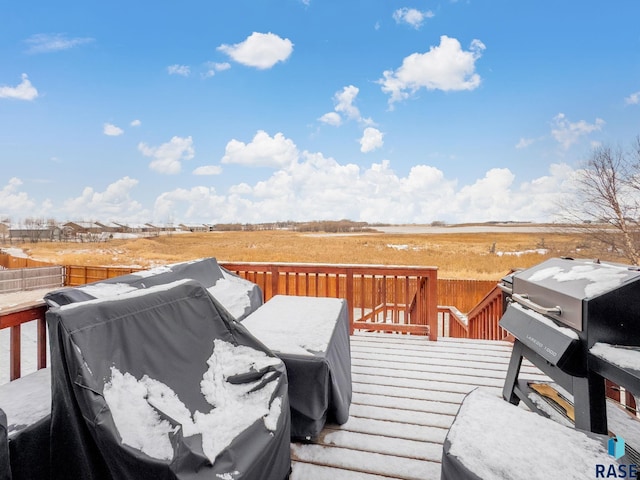 wooden terrace featuring a grill