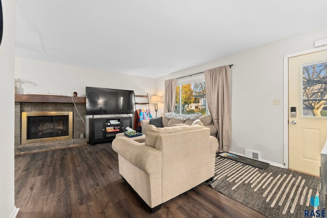 living room with dark hardwood / wood-style floors