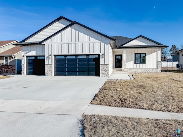 modern farmhouse style home with a garage and a front yard