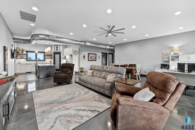 living room featuring ceiling fan