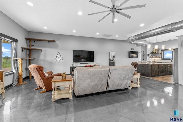 living room with ceiling fan