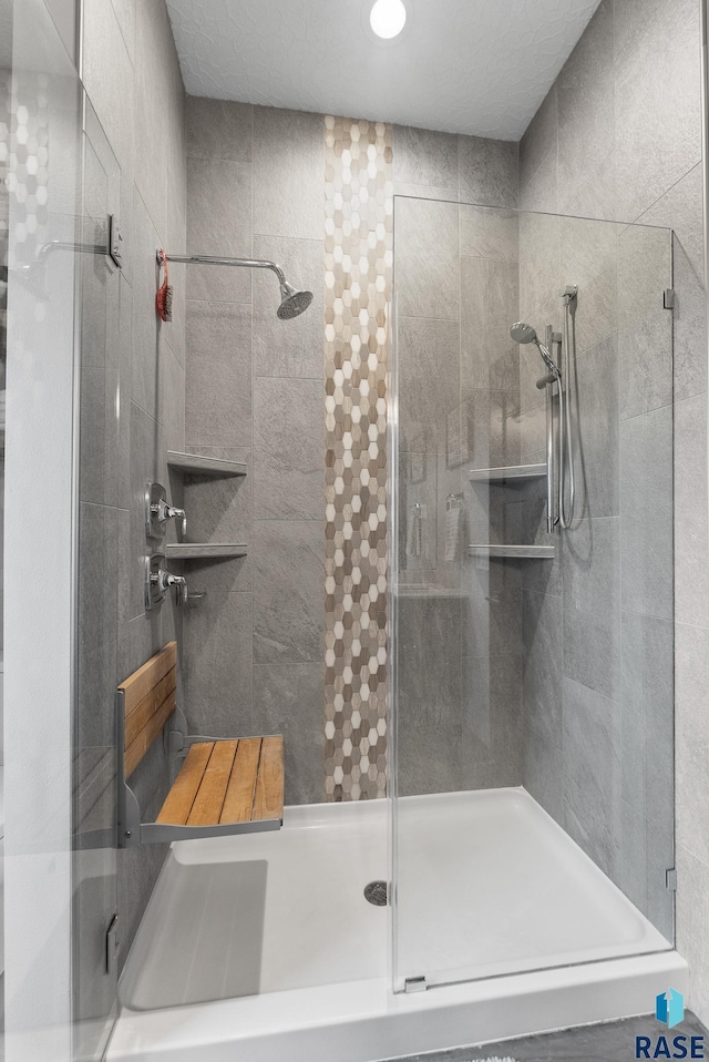 bathroom with an enclosed shower