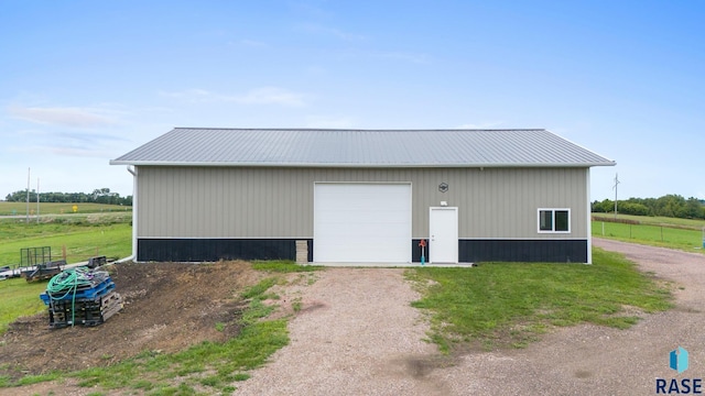 view of outbuilding with a garage